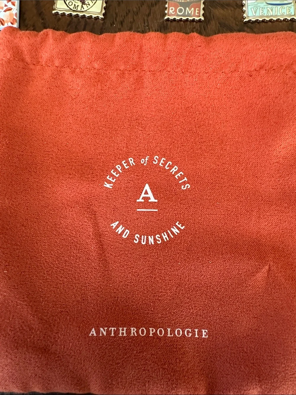 Anthropologie Coral Red Velvet Pouch with Logo